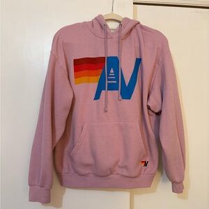Aviator Nation Pink Hoodie with Blue Logo and Rainbow Stripes